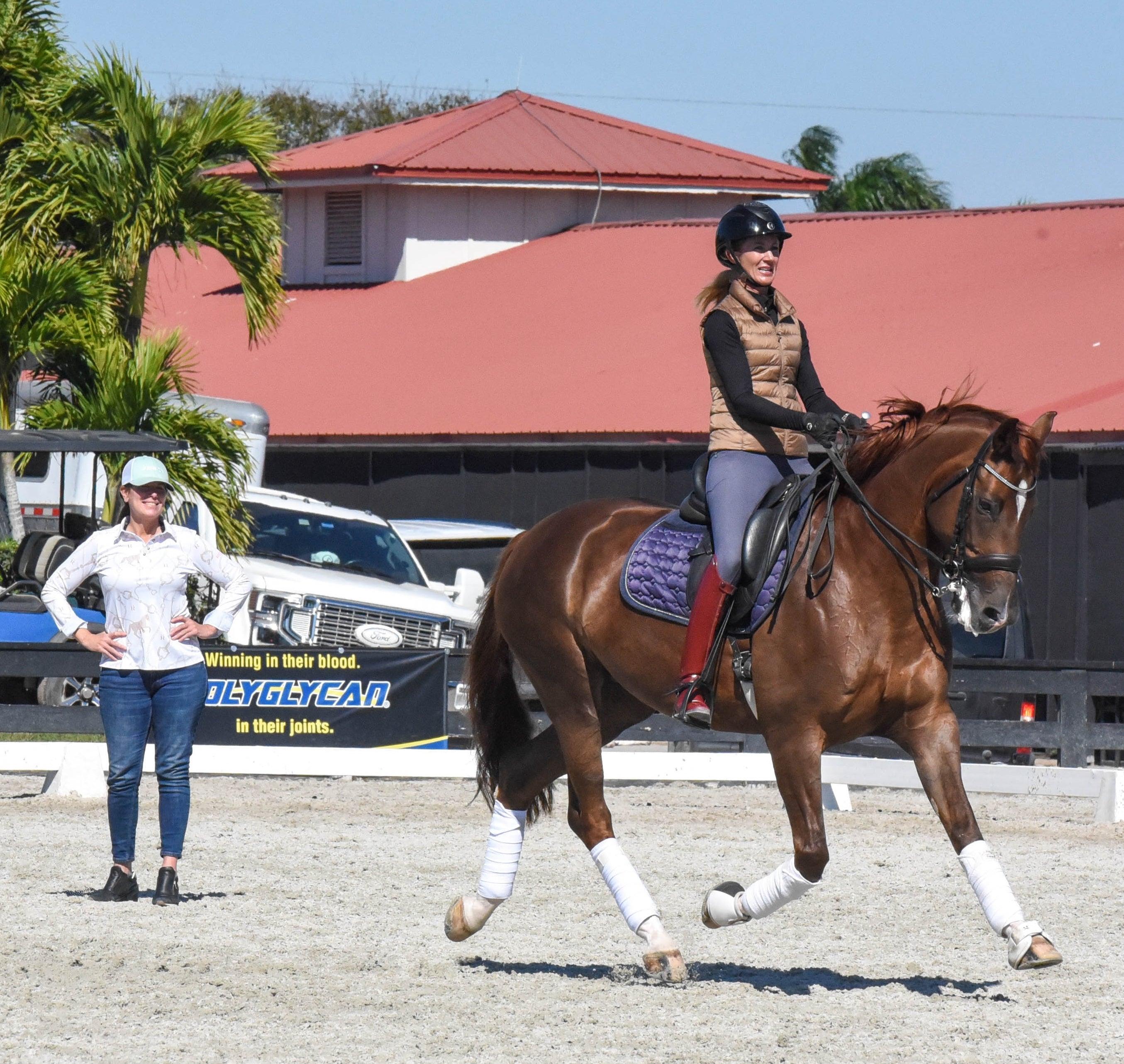 Woman riding dressage horse